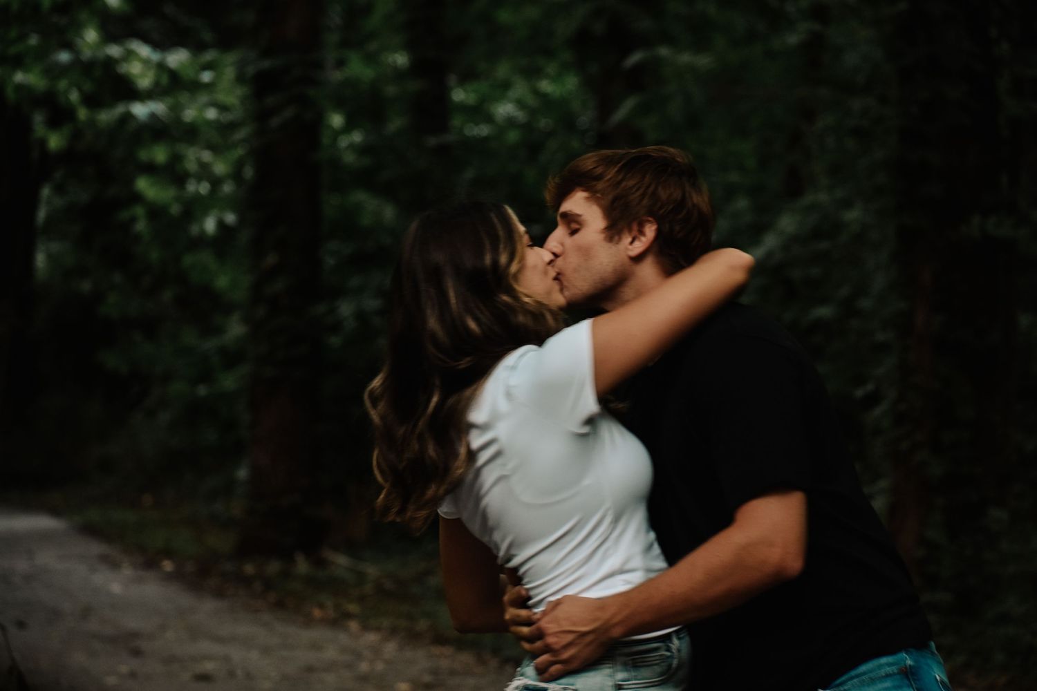 kc engagement shoot, man and woman kiss motion blur