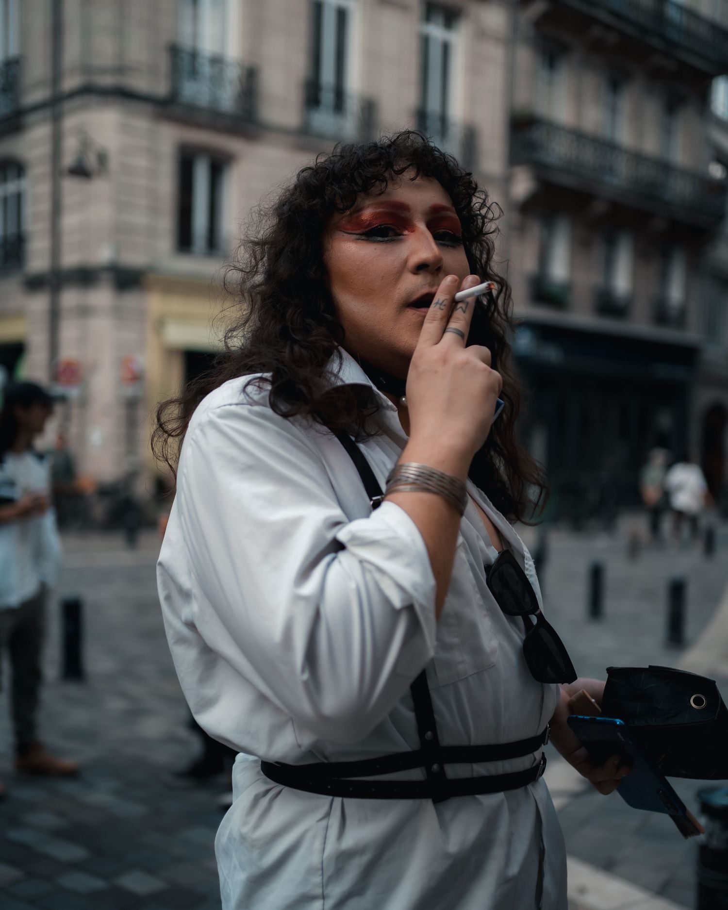 Drag performer preparing for a show, captured by an artistic photographer specializing in live performance photography