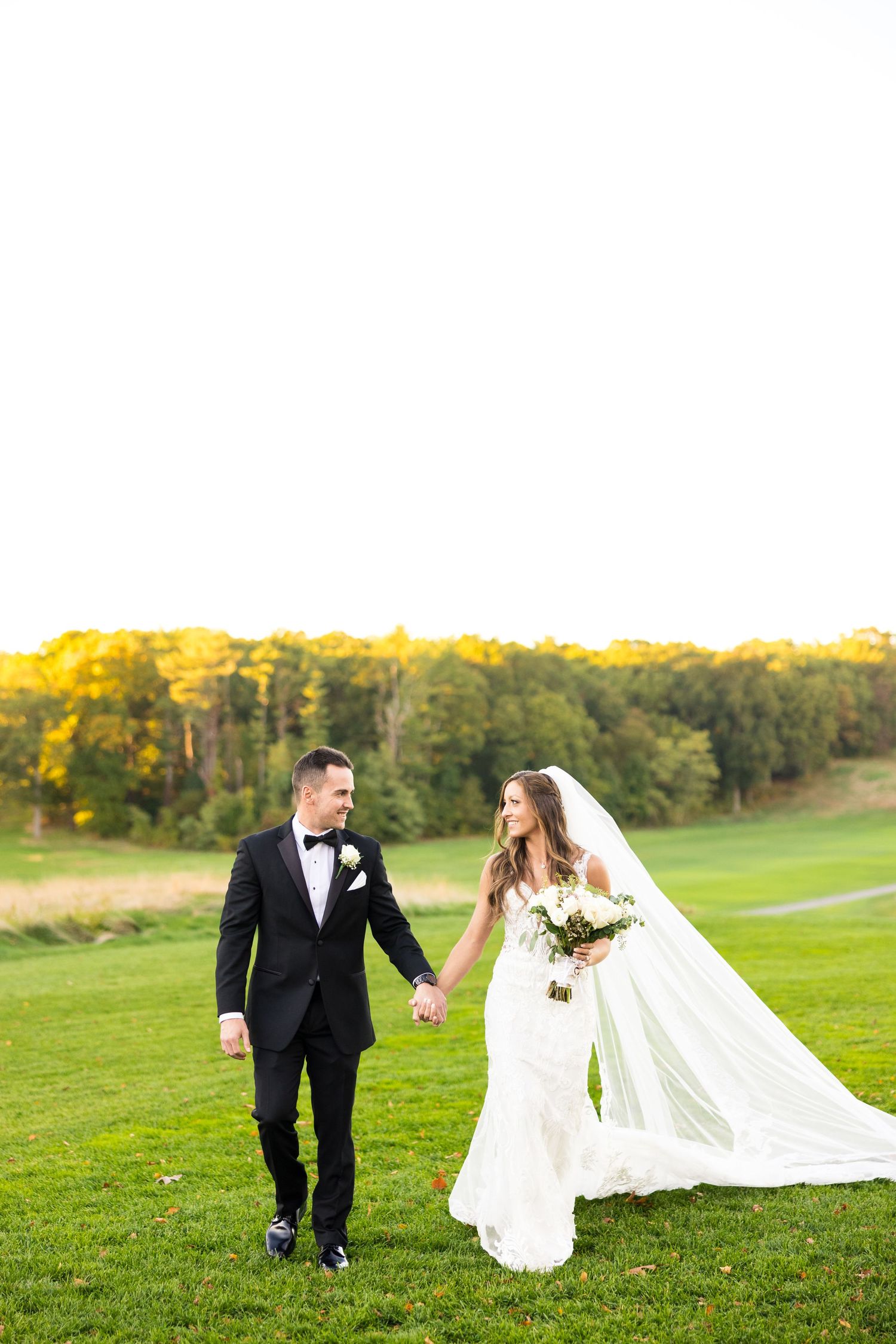 Walking toward the camera at the heritage club at bethpage
