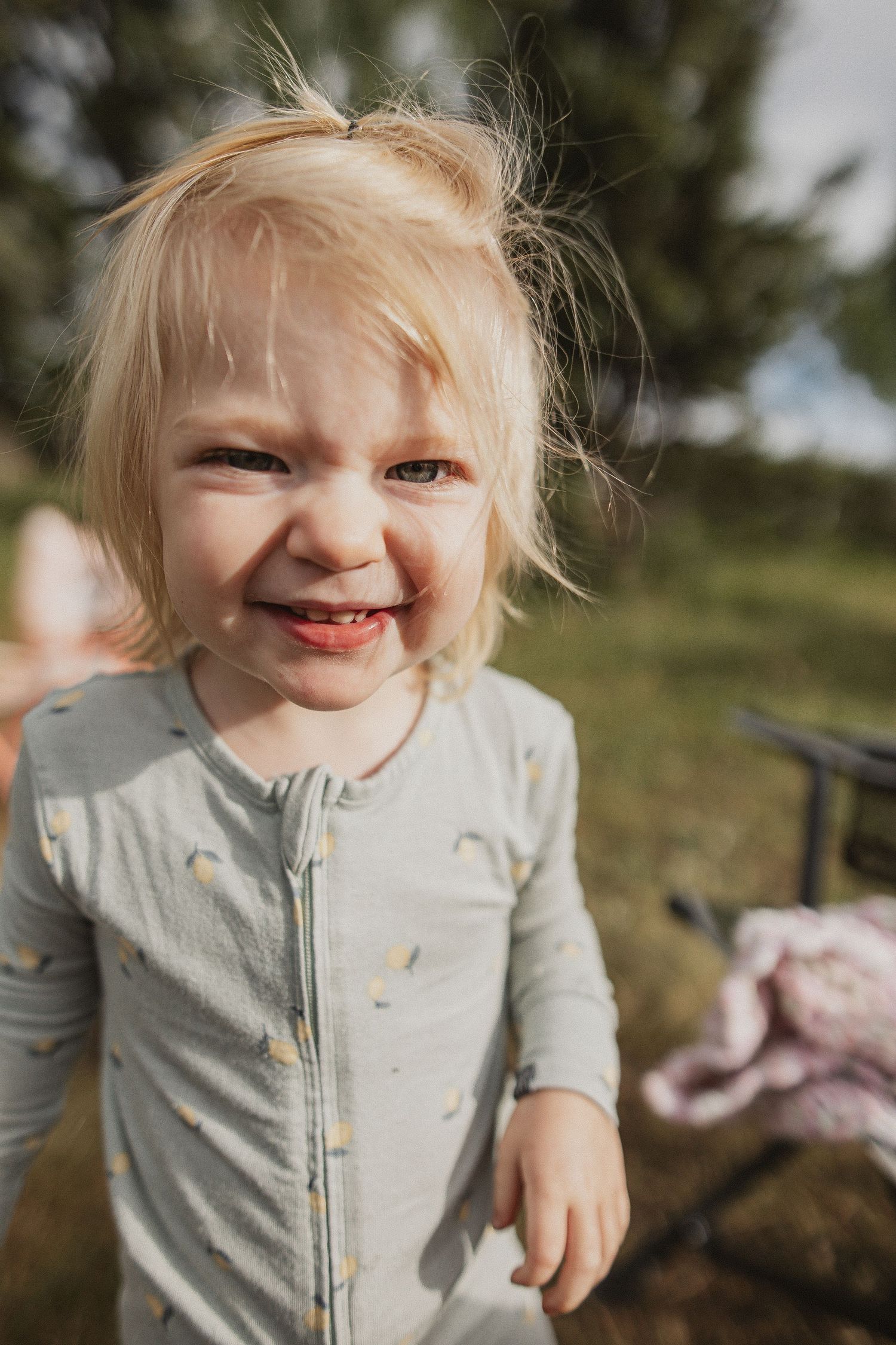 Joyful outdoor camping moment captured in natural lighting.