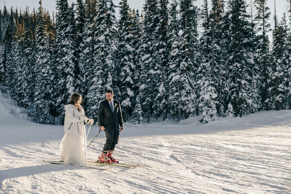 Elopement or wedding skiing photography