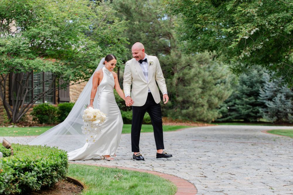 Wedding couple walking together. Colorado. Denver. Wedding photographer.