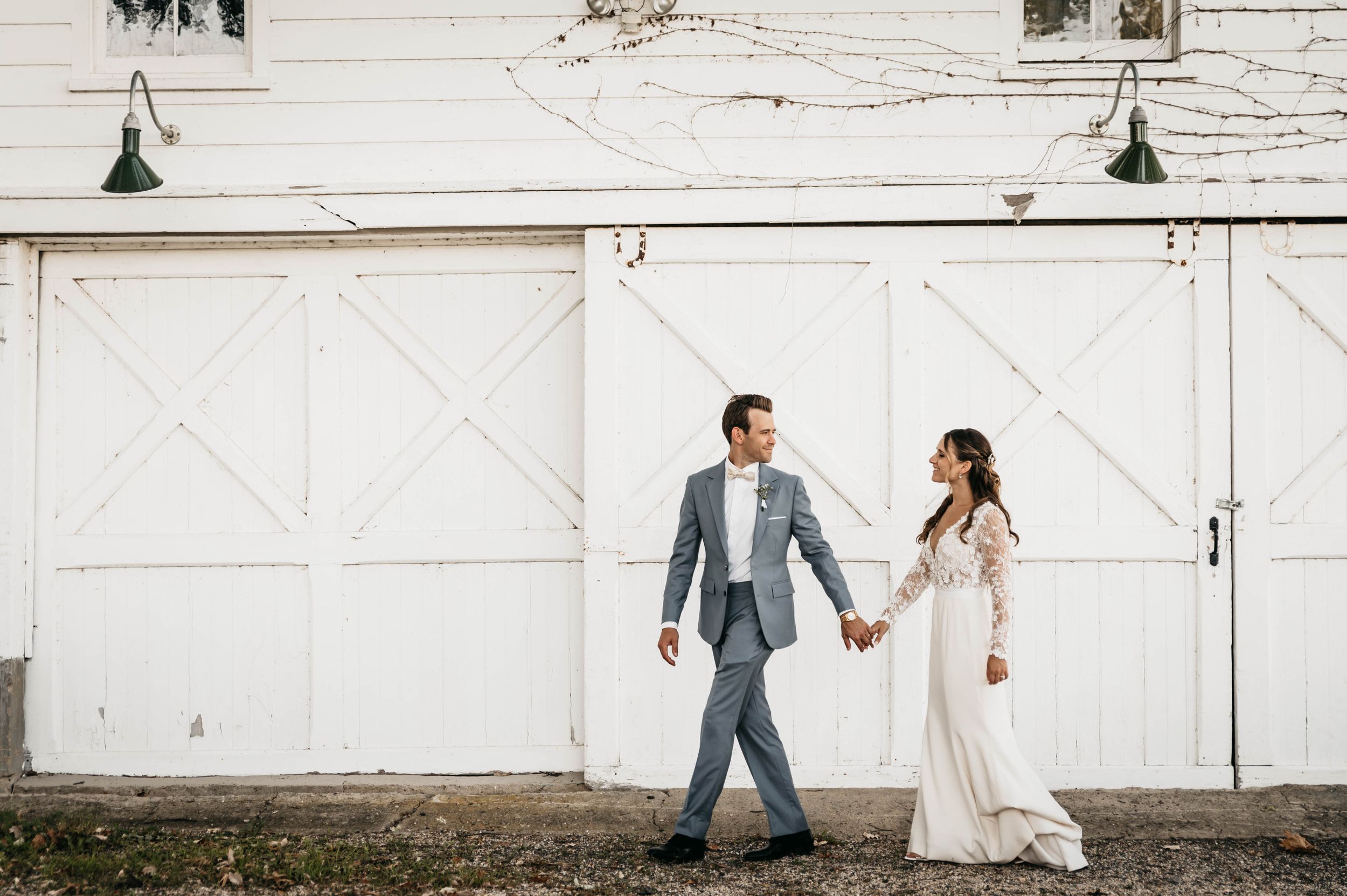 Wedding photo in front of a barn. Wedding photography.