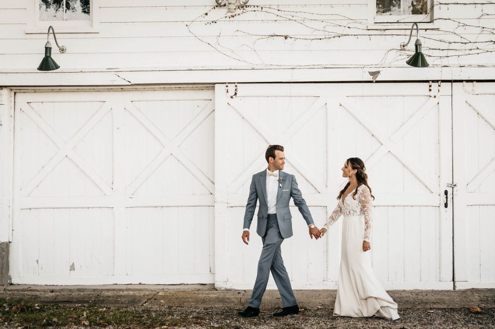 Wedding photo in front of a barn. Wedding photography.