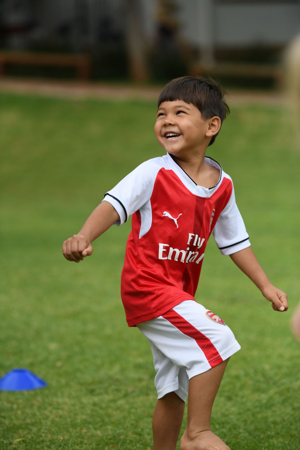 Photo of a boy doing gross motor skills at The Bridge Nursery school