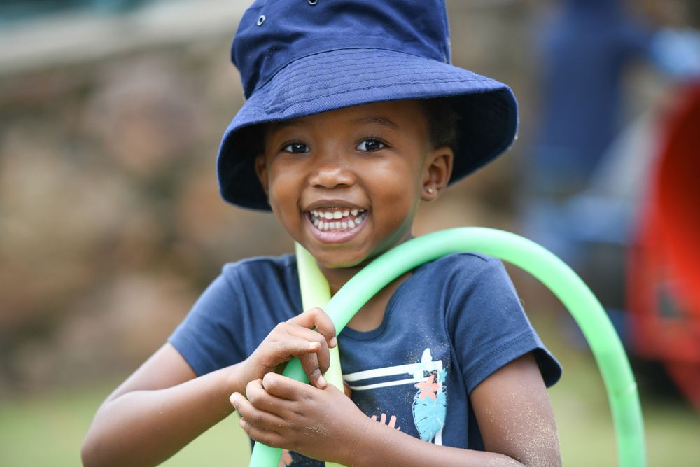 Happy photo of a girl at a school photo shoot