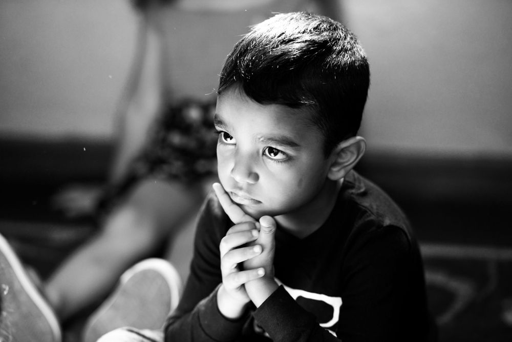 Boy in class at a nursery school photo shoot