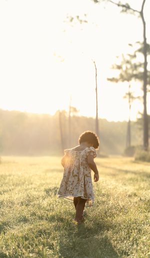 sunrise photo of little girl