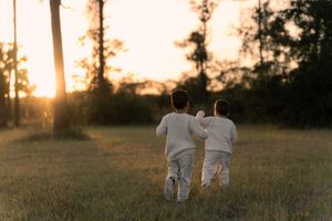 Brothers running and playing
