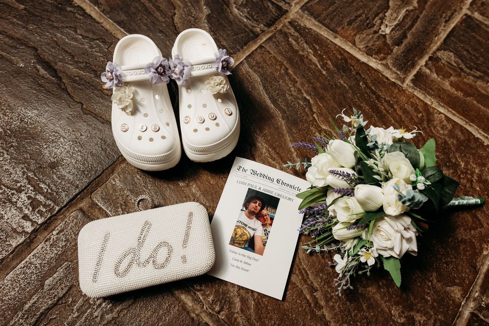 Artistic wedding detail collage featuring white shoes, floral arrangements, and polaroid photos on wooden surfaces.