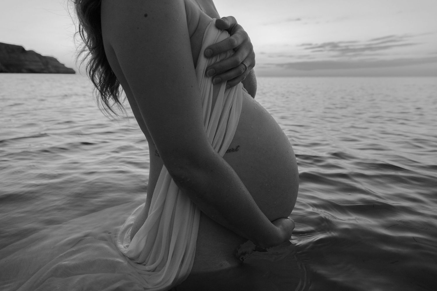 Beach nude maternity photography session