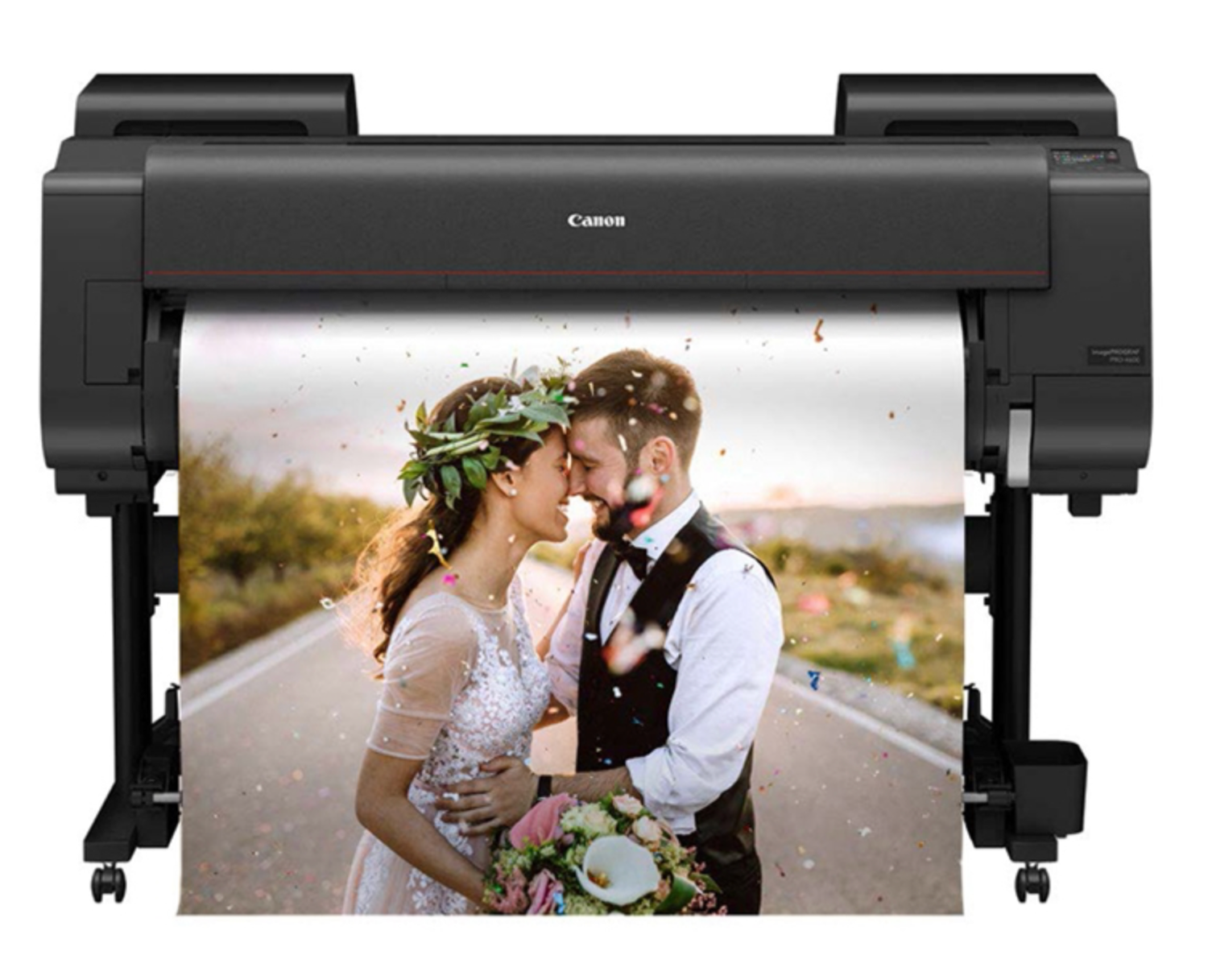 Large format printers producing wedding photographs on display.