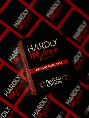 Dating card game 'Hardly in Love' with red and black packaging design.