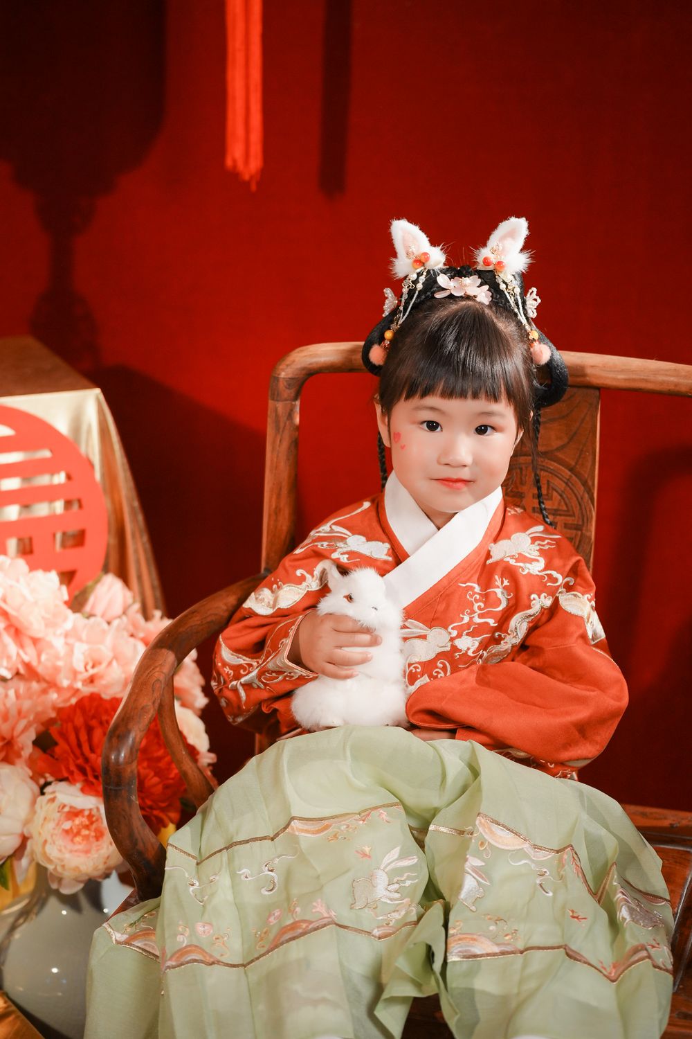 Adorable kids studio portrait featuring a cute child in traditional Ming Dynasty Hanfu, by Imagine Image Studio Auckland.