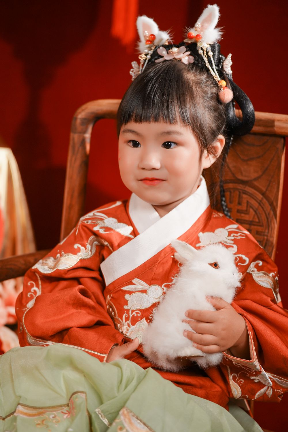 Adorable kids studio portrait featuring a cute child in traditional Ming Dynasty Hanfu, by Imagine Image Studio Auckland.