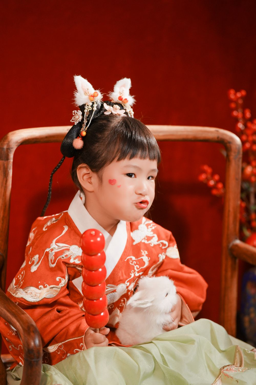 Cute solo children's photography in an elegant Ming Dynasty Hanfu, beautifully shot in studio by Imagine Image Studio.