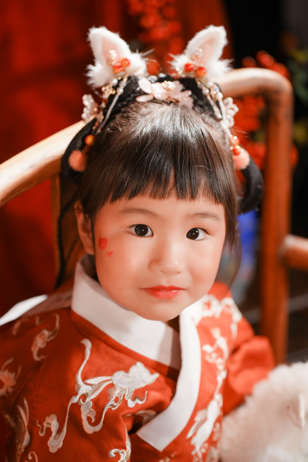 Cute solo children's photography in an elegant Ming Dynasty Hanfu, beautifully shot in studio by Imagine Image Studio.