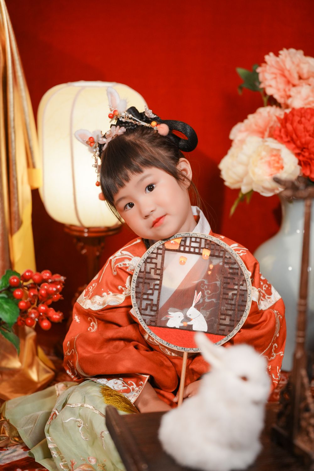 Cute solo children's photography in an elegant Ming Dynasty Hanfu, beautifully shot in studio by Imagine Image Studio.