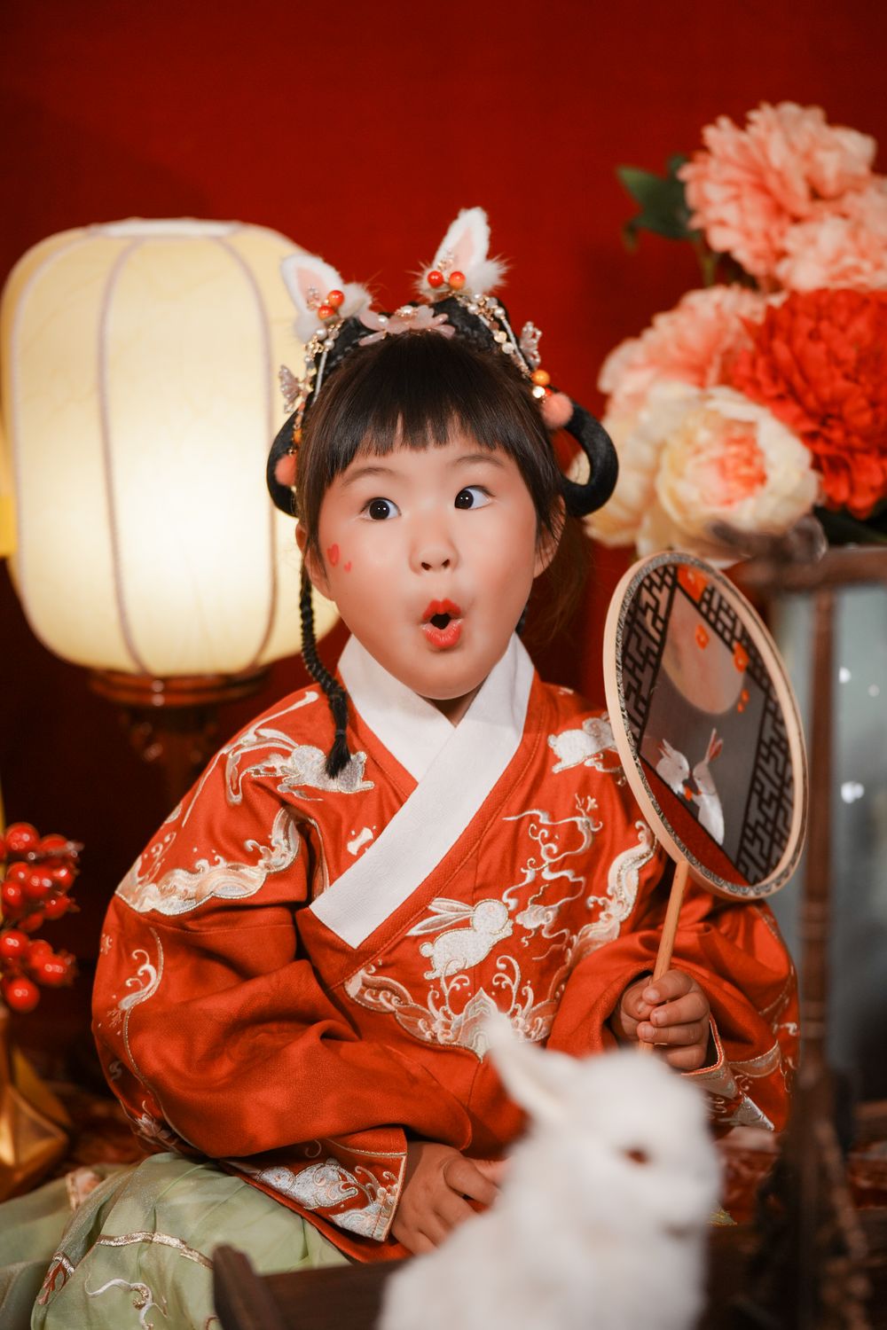 Cute solo children's photography in an elegant Ming Dynasty Hanfu, beautifully shot in studio by Imagine Image Studio.