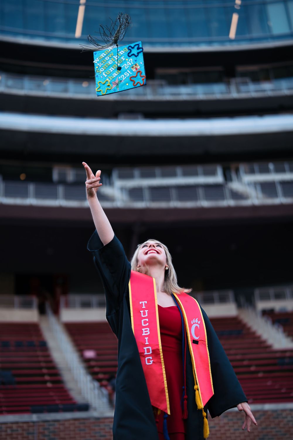 Morgan getting her senior portraits done at the University of Cincinnati downtown at the Bearcat's stadium for graduation : Senior Portrait