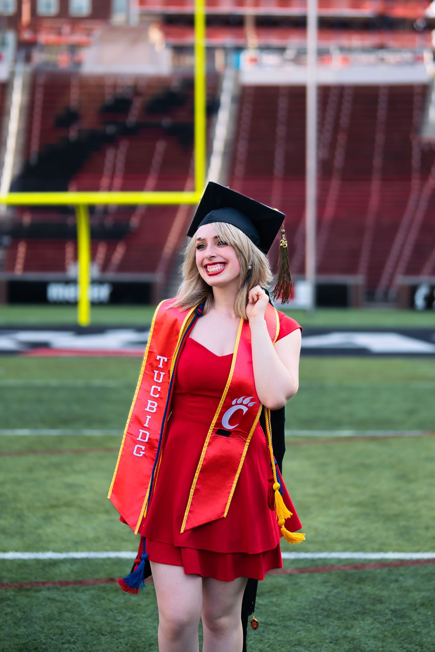 Morgan getting her senior portraits done at the University of Cincinnati downtown at the Bearcat's stadium for graduation : Senior Portrait