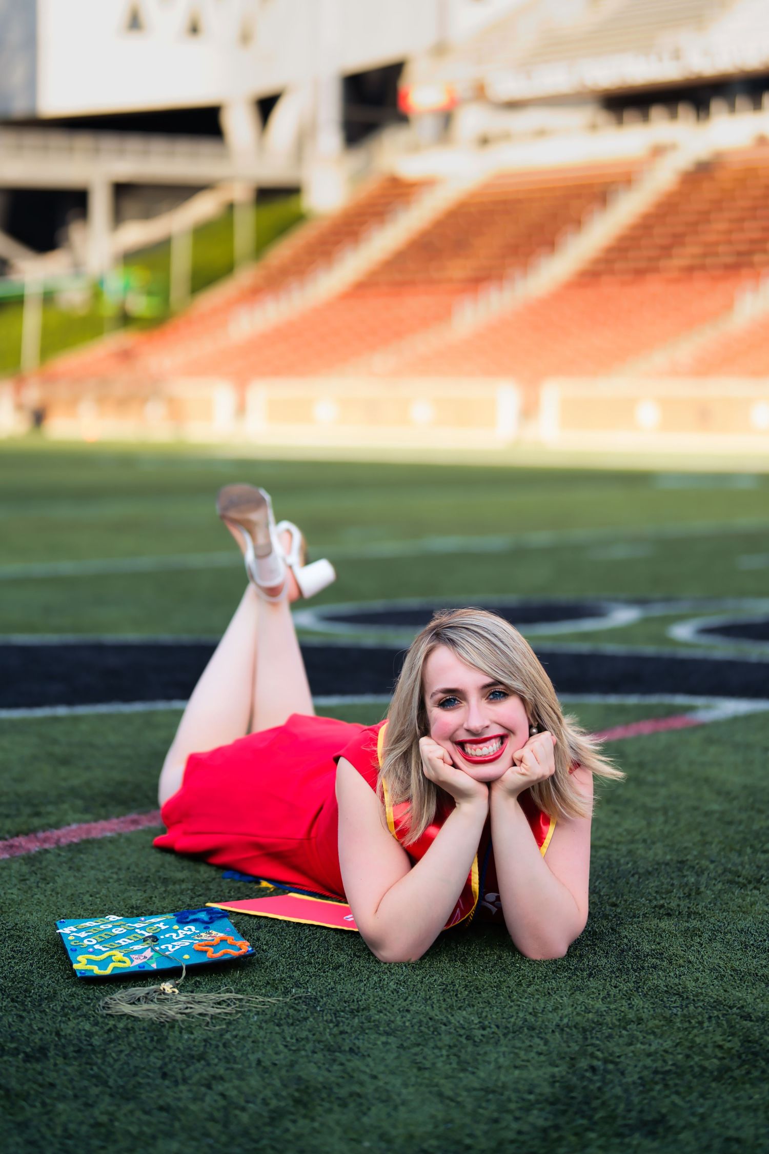 Morgan getting her senior portraits done at the University of Cincinnati downtown at the Bearcat's stadium for graduation : Senior Portrait