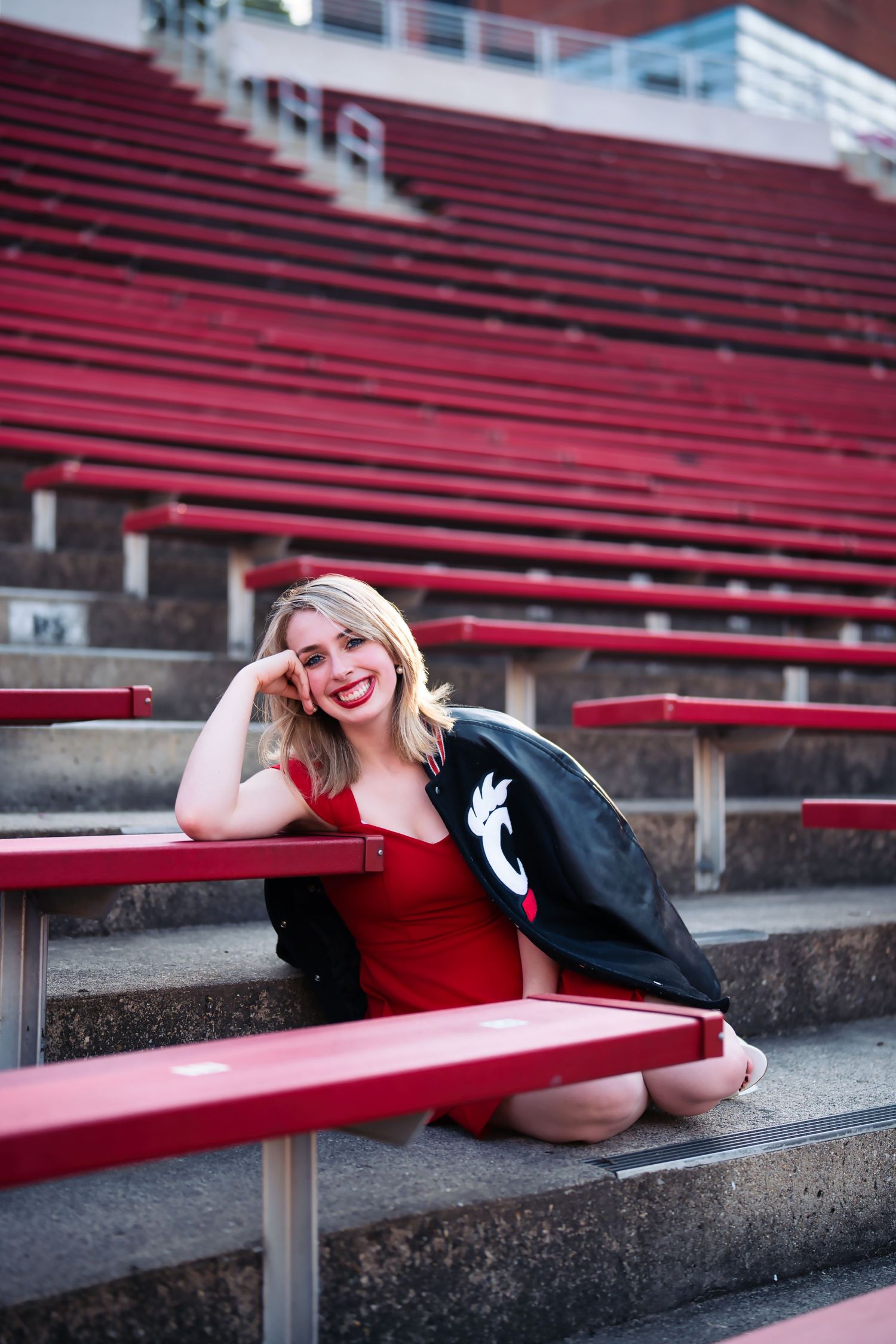 Morgan getting her senior portraits done at the University of Cincinnati downtown at the Bearcat's stadium for graduation : Senior Portrait