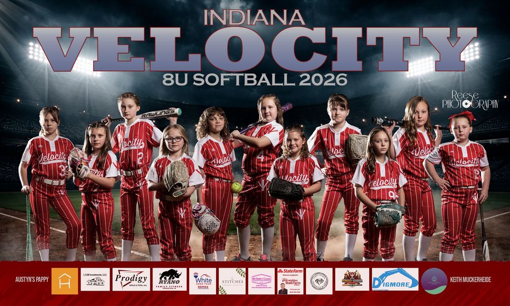 Indiana Velocity 8U Softball 2026 team photo featuring young girls in red and white uniforms posed on a softball field.