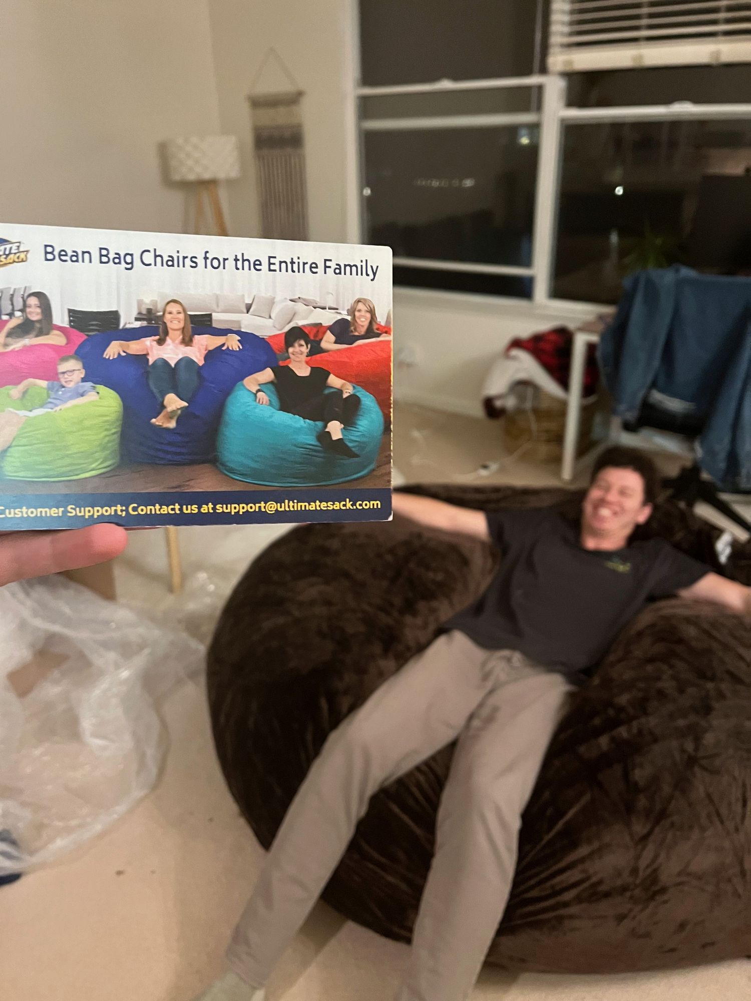 Multiple bean bag chairs arranged in a modern living room setting.