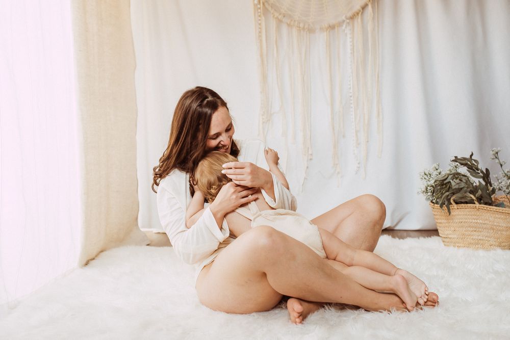 Soft and dreamy lifestyle photography with white fabric and natural lighting.