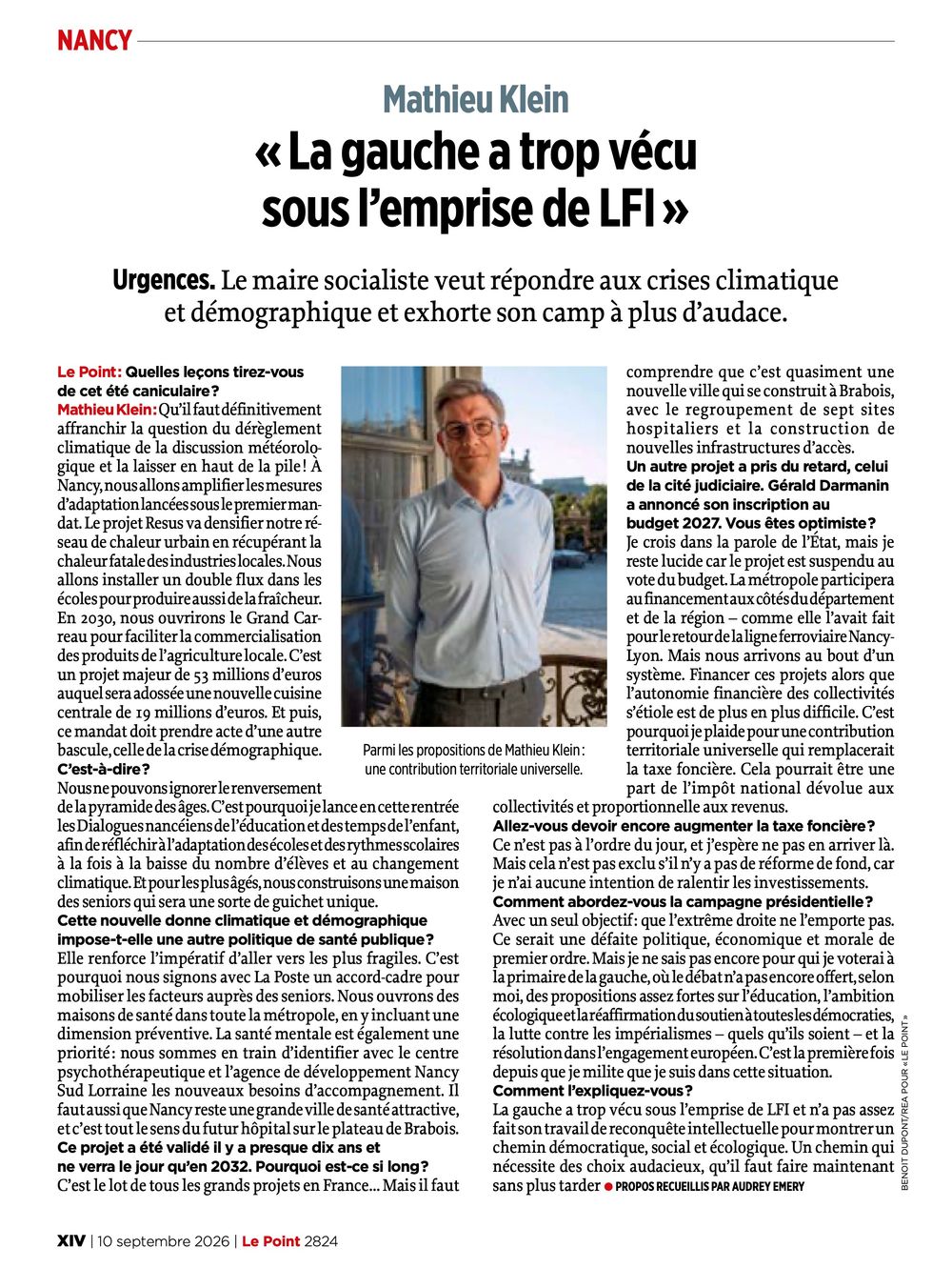 Mathieu Klein, maire socialiste de Nancy, pose devant un fond neutre lors d'une interview politique pour Le Point.