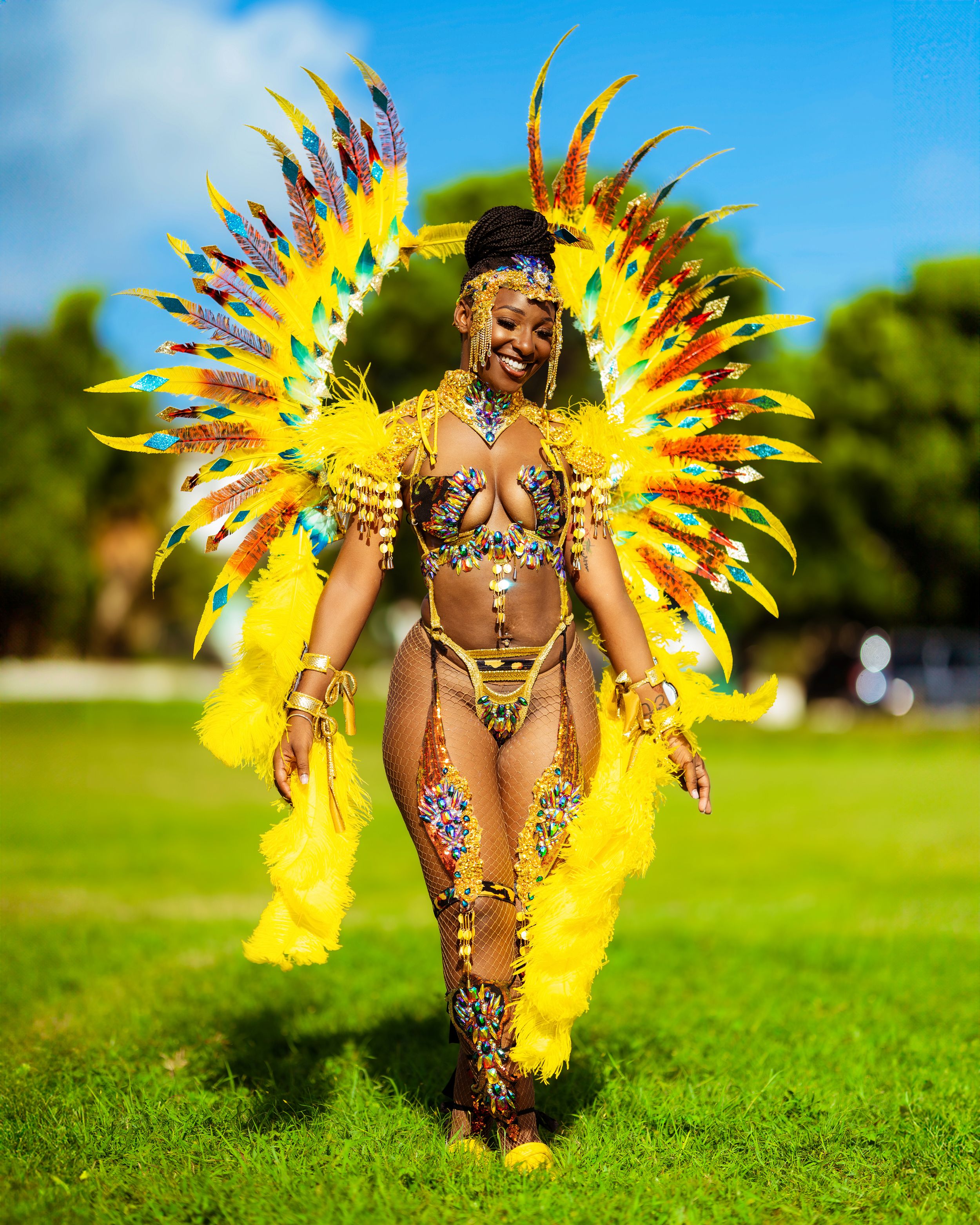 Carnival dancer in yellow costume — vibrant editorial by Timoy B Photography.