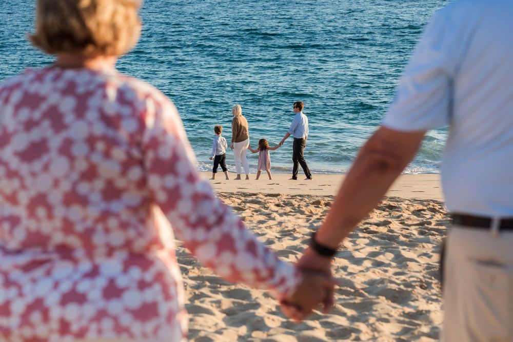 Family candid moment with ocean breeze