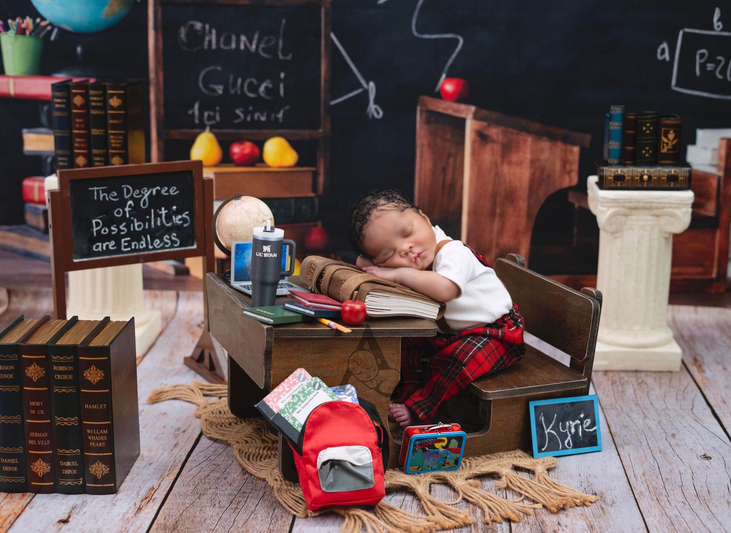 Vintage classroom setting with chalkboard, wooden desk, and school supplies.