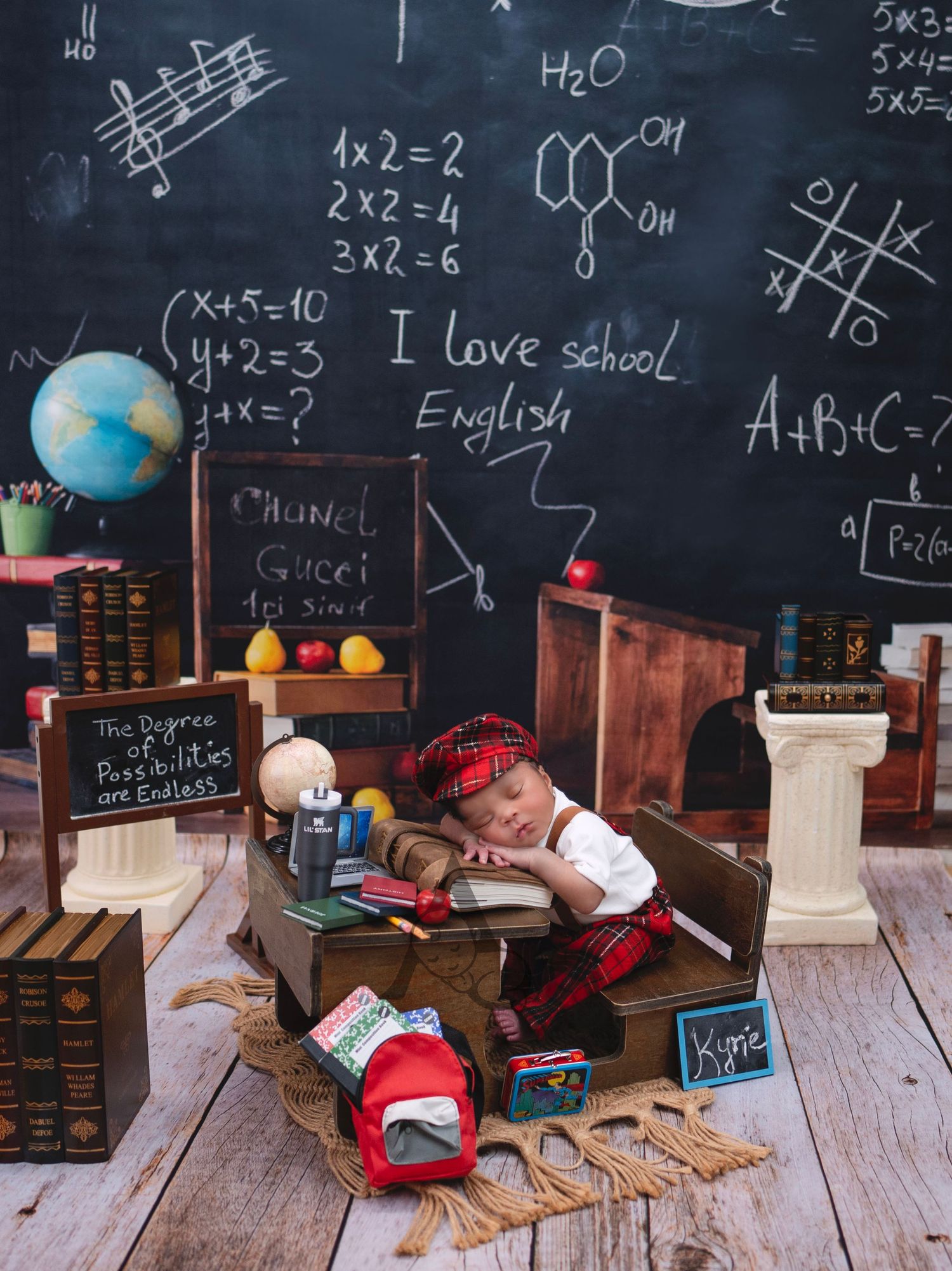 Educational setup with chalkboard showing math equations and school materials.