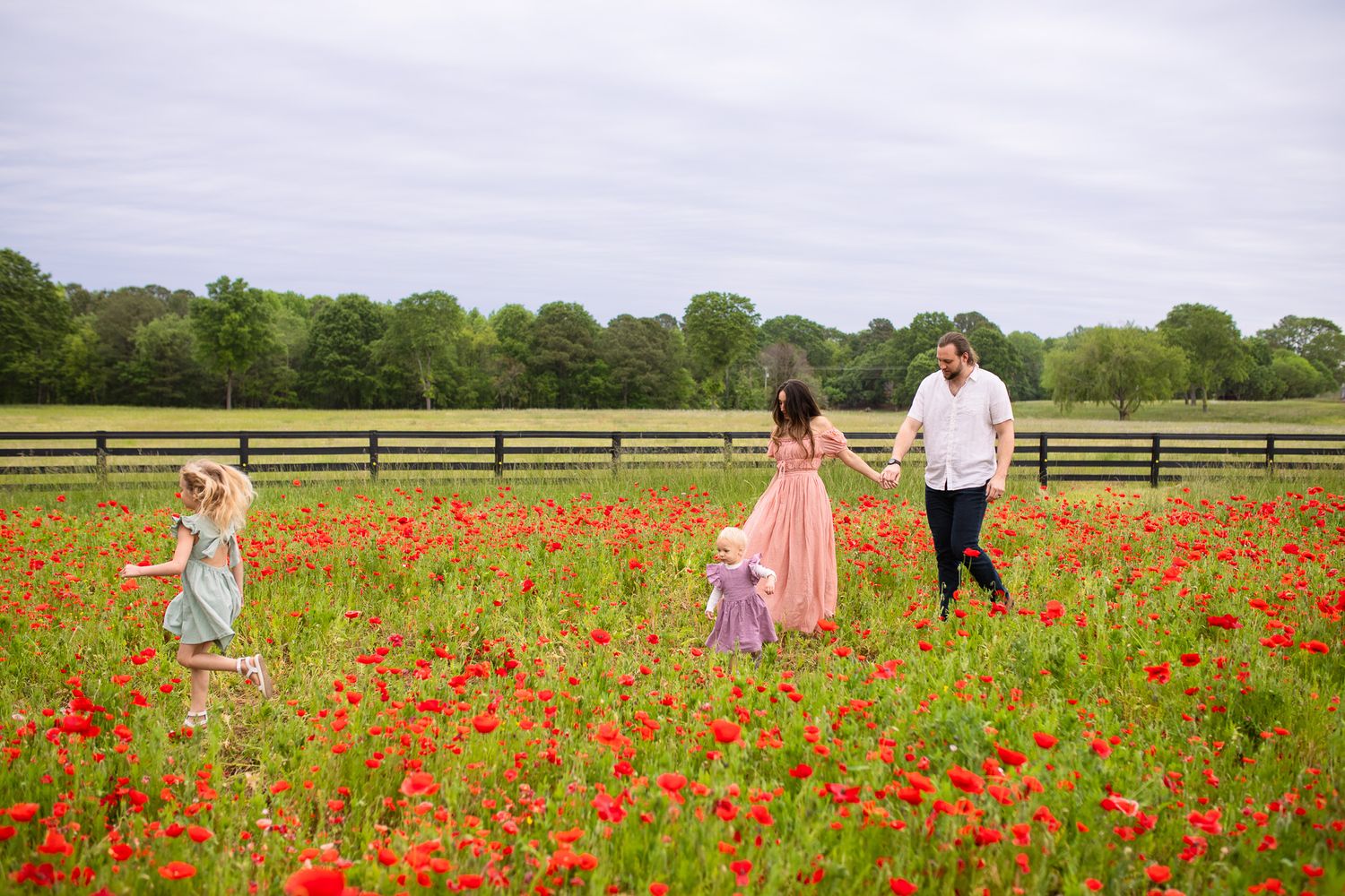 Family Session in poppy field in Raleigh, NC. local farm in Juniper Creek Farm