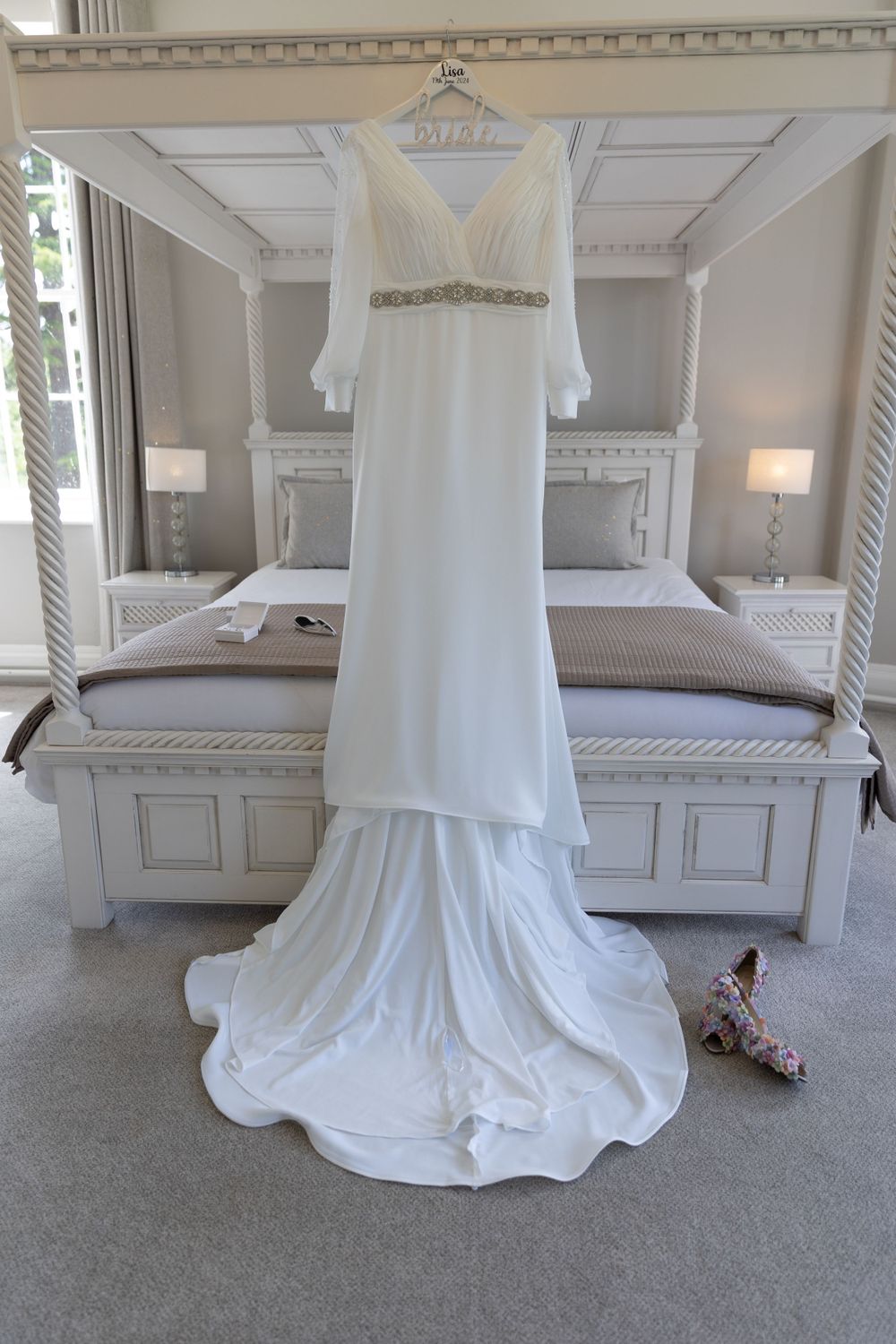Wedding dress hanging up waiting to be worn at Eastington Park