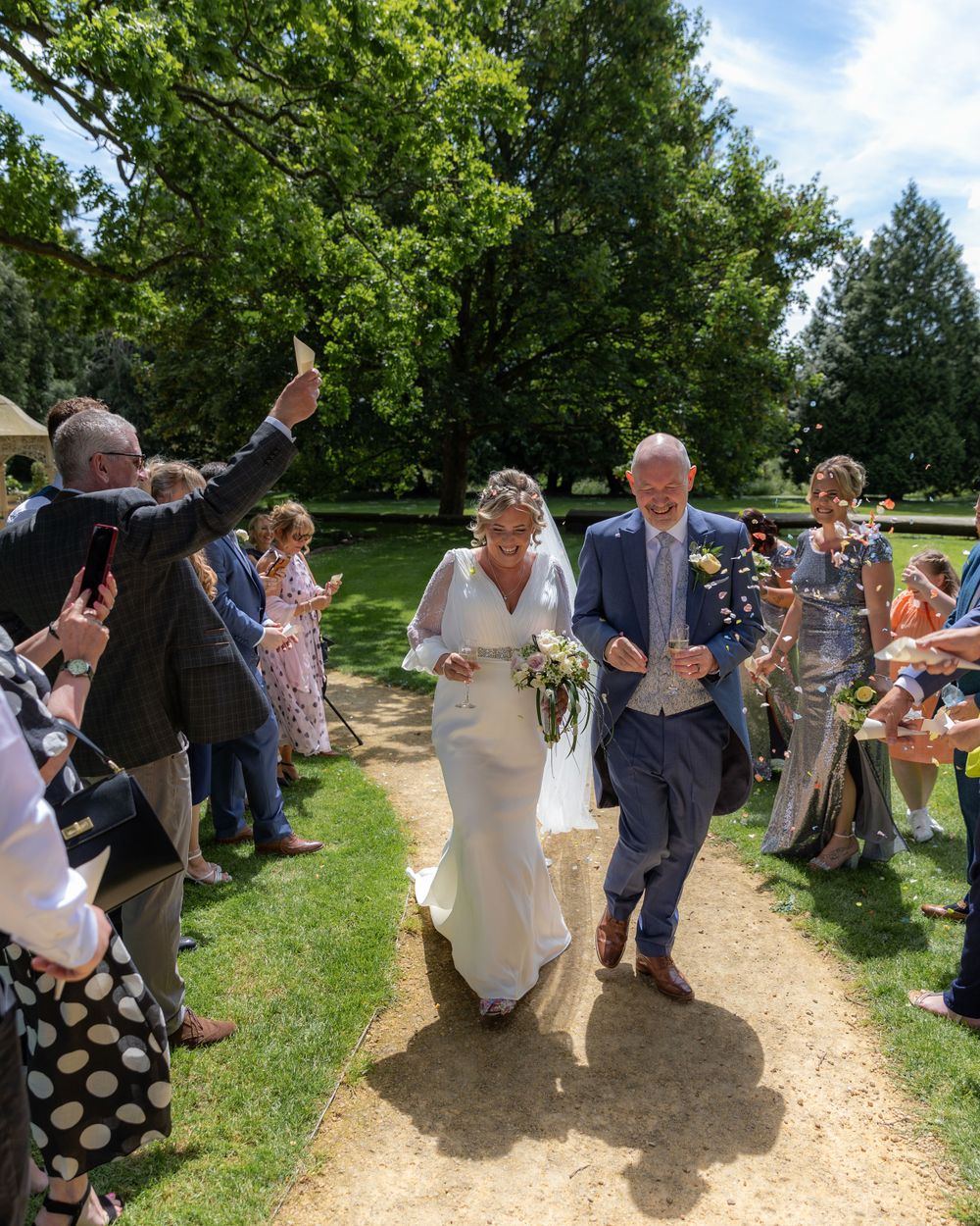 Confetti photo of bride and groom at Eastington Park