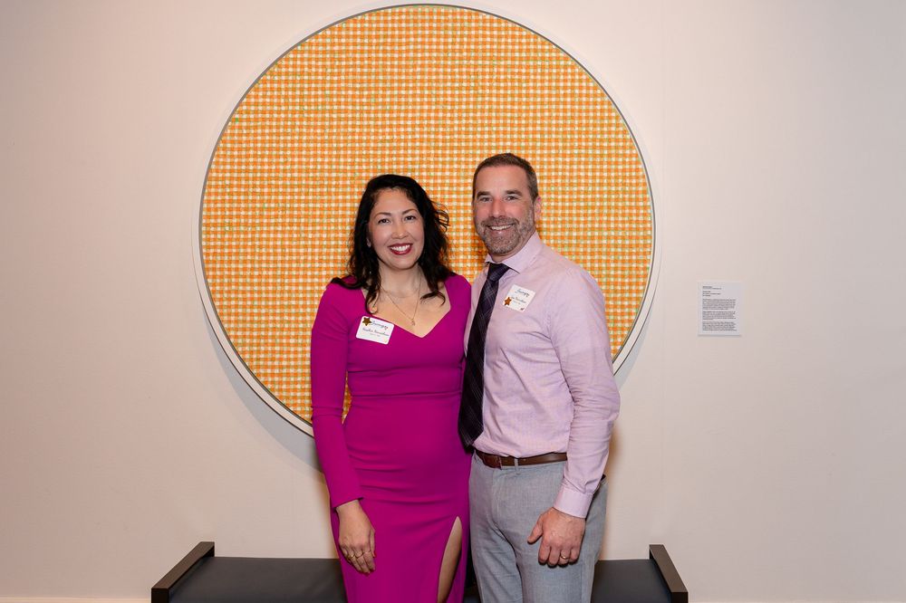 A couple in front of an art installation during an event taken by Milwaukee event photographer Rachel Dickman