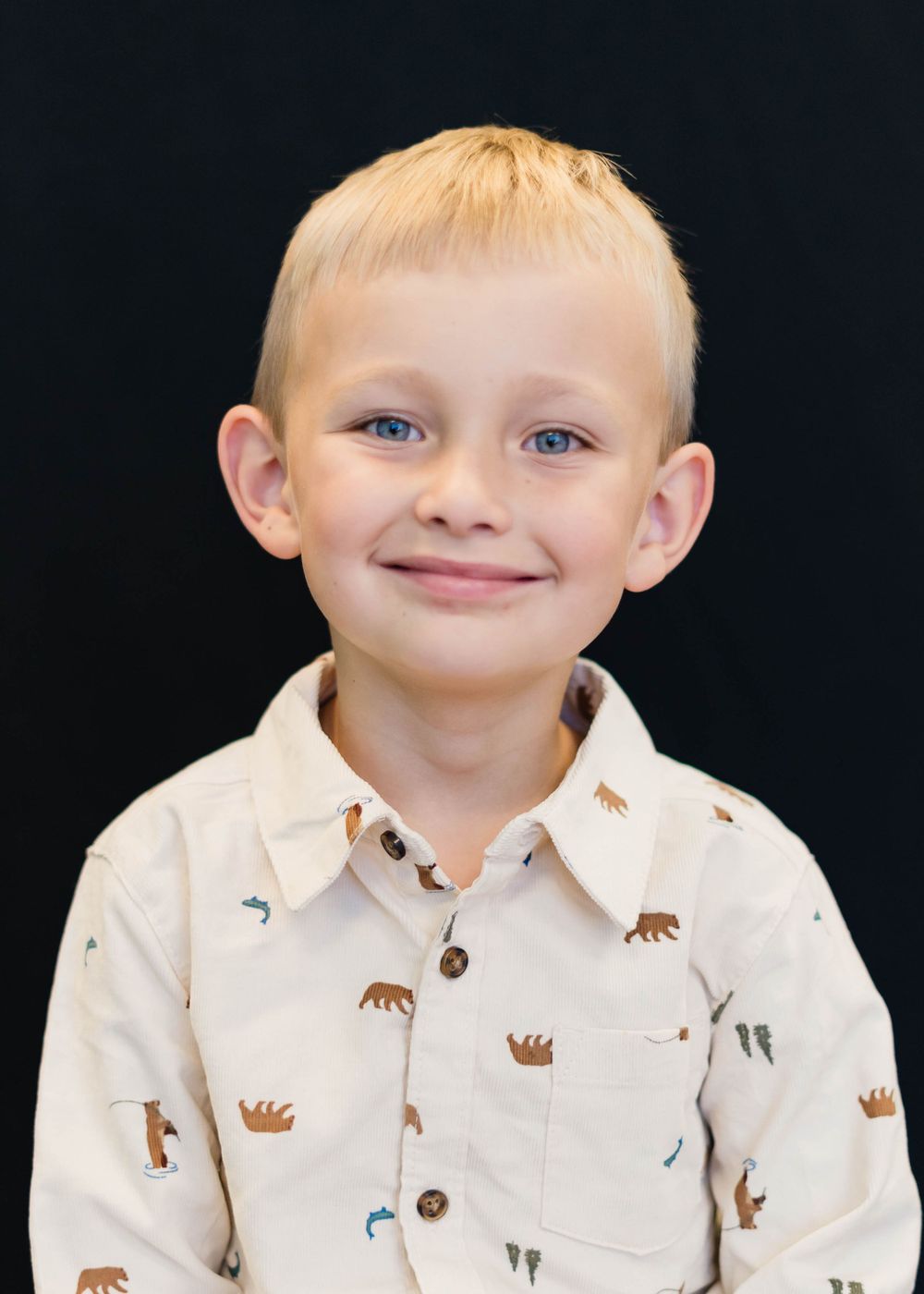Thoughtful preschooler portrait with minimal styling