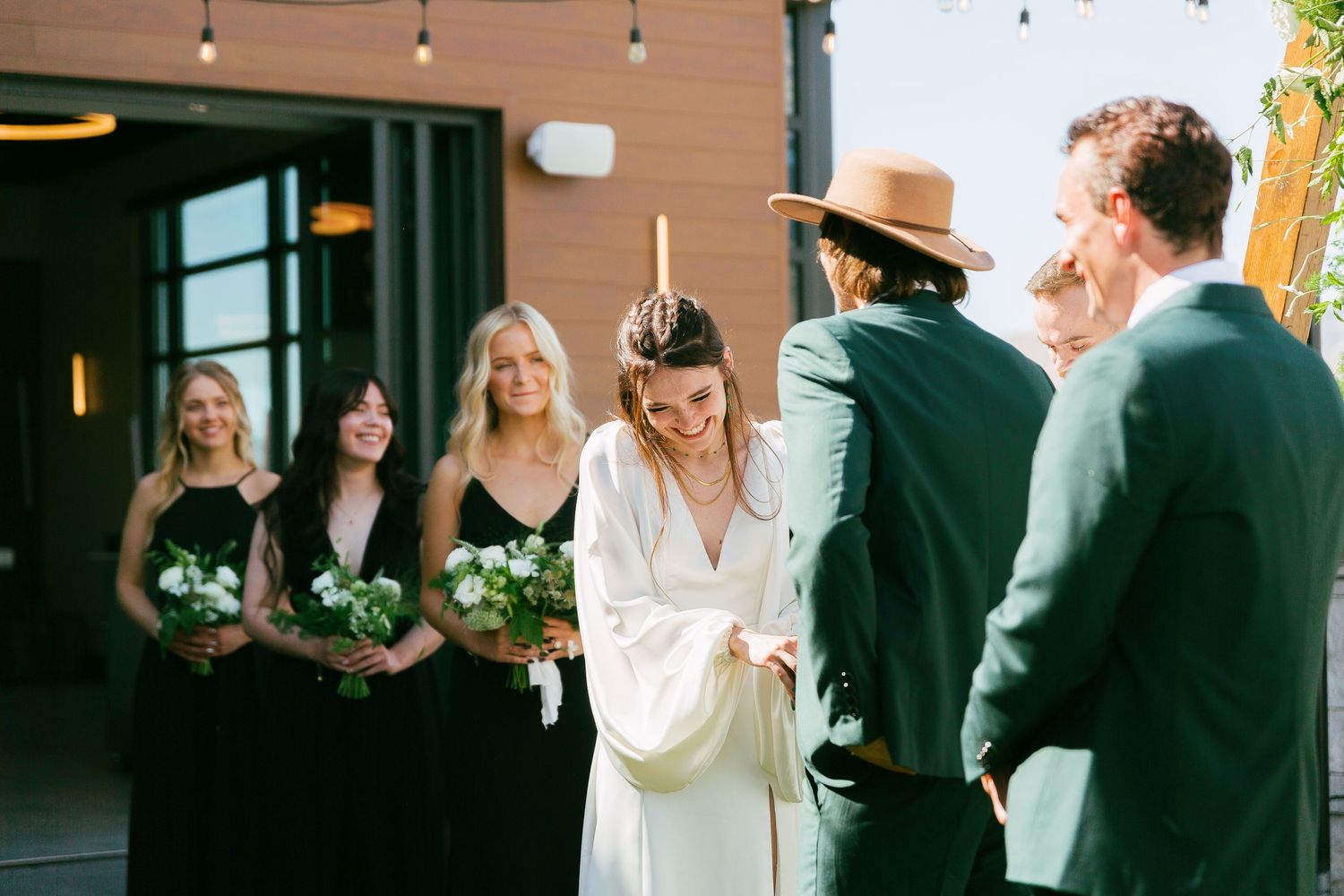 couple smiling at each other during the wedding ceremony in utah