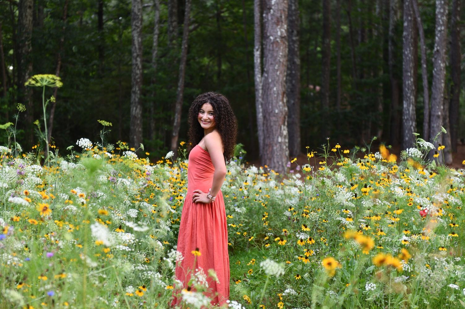 Couples portrait in wildflower field