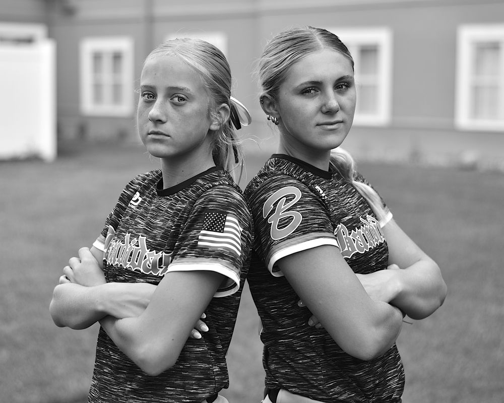 Black and white photograph of two softball players in Illinois by William Wayland