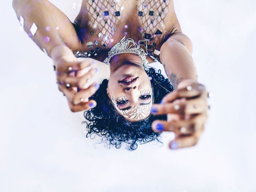 Shiny purple mermaid on a white background, showcasing a vibrant and magical look.