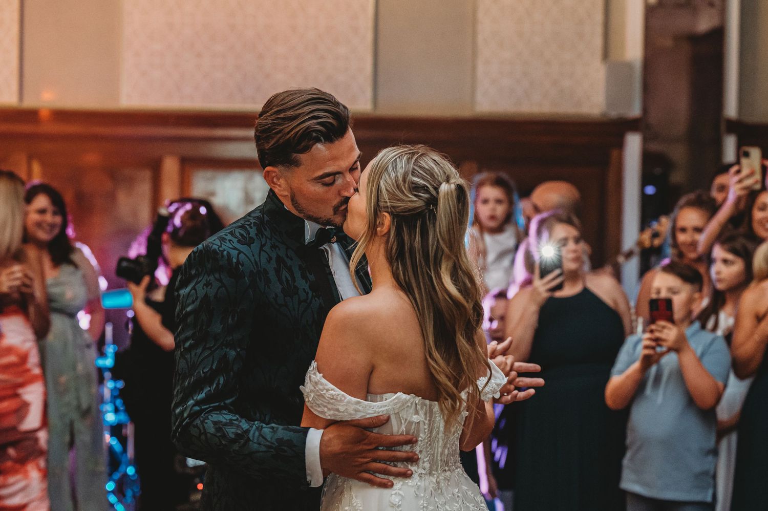 Romantic first dance moment at an elegant wedding reception.
