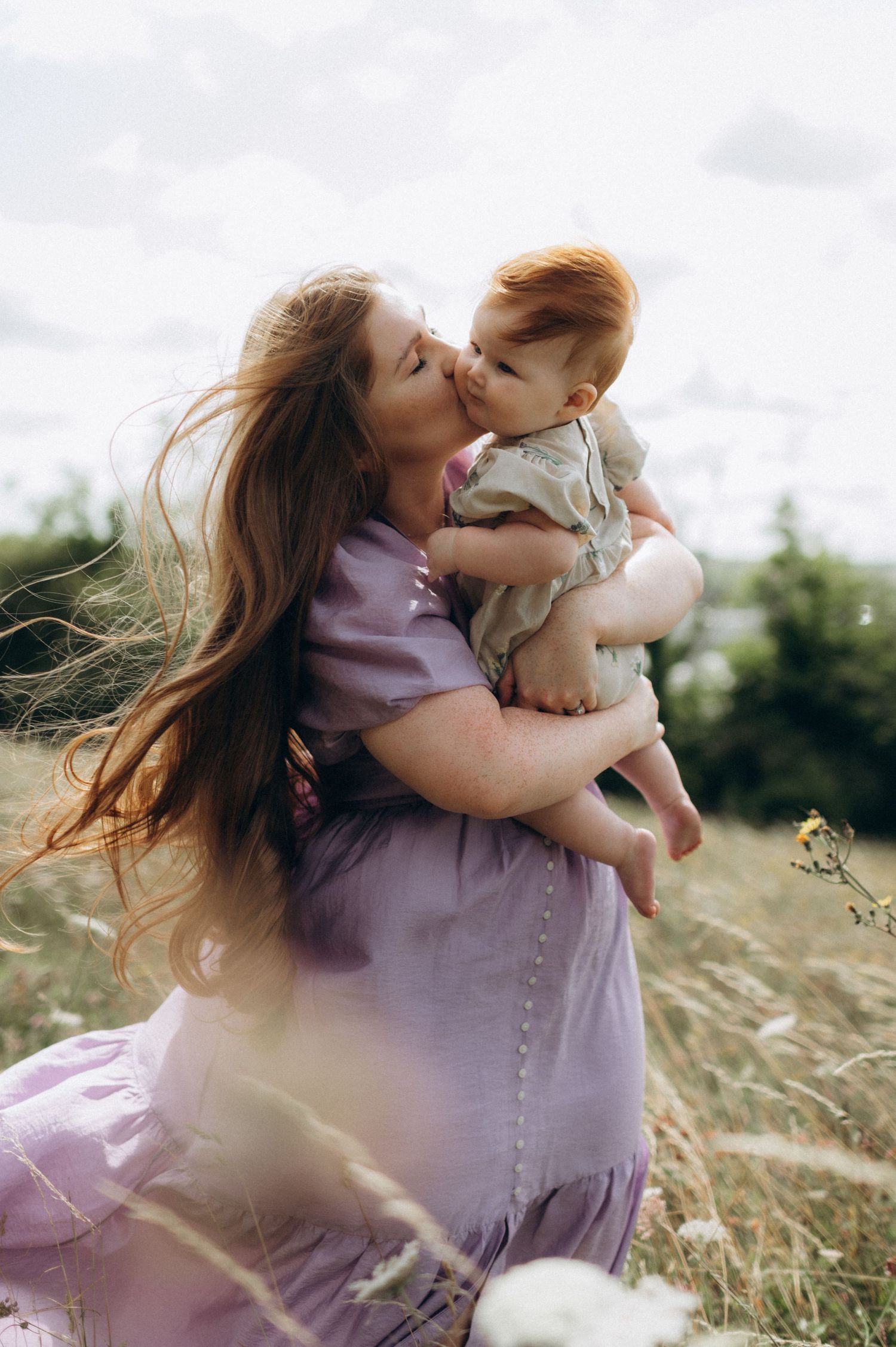 mother with daughter in flower field, Ranscombe Farm, family photographer kent