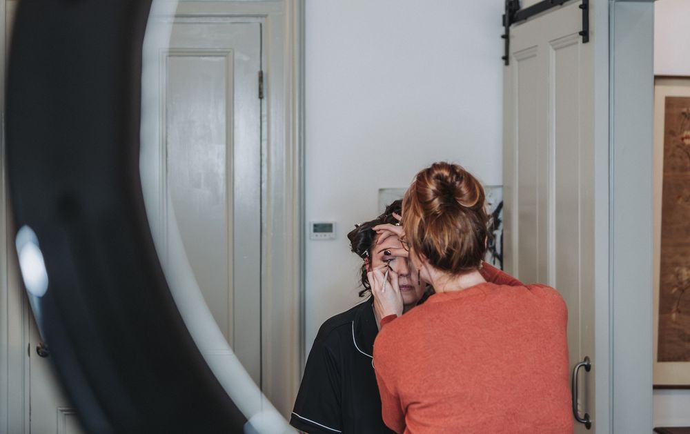 A sequence of photos showing someone opening a door, entering a bathroom, and closing the door behind them.