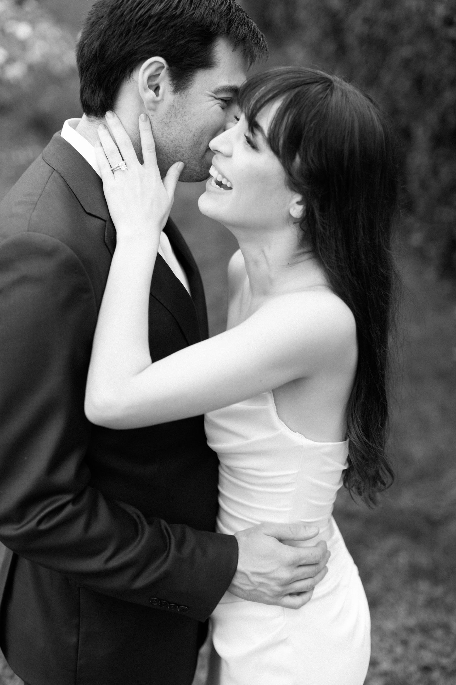 Black and white photo of a bride during an elopement, radiating grace and beauty