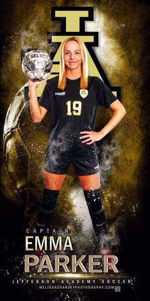Jefferson Academy soccer team portrait with athlete #19 in black uniform holding trophy against dramatic gold background.