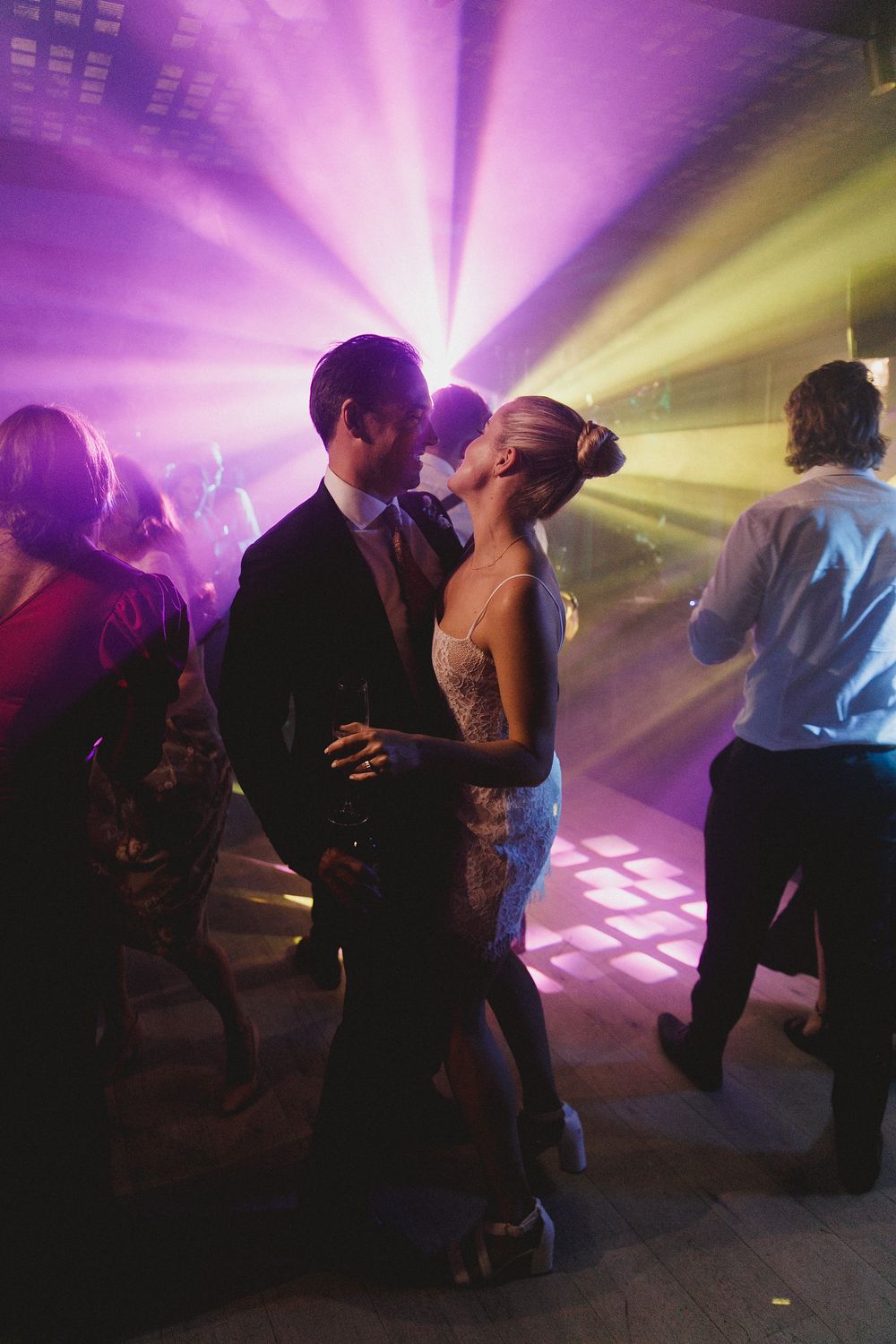 Bride and groom dancing and celebrating at Johannesdal 1207 wedding reception